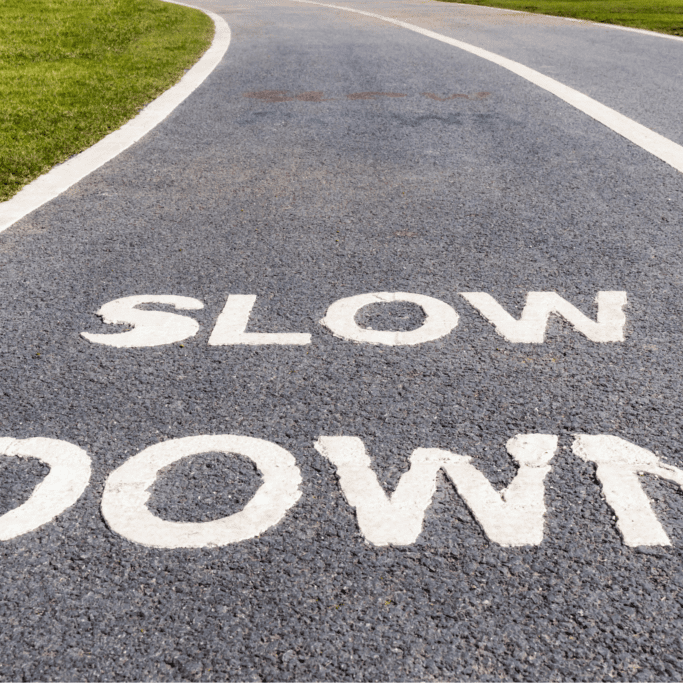 Sales process best practices illustrated by a running track labeled “slow” to represent pacing the sales process instead of rushing to close